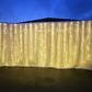 White curtain and  warm LED light backdrop includes a $25 bond refunded after your hire.