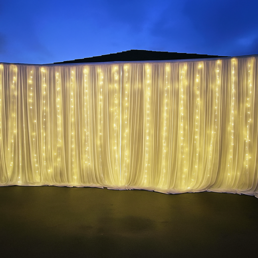 White curtain and  warm LED light backdrop includes a $25 bond refunded after your hire.