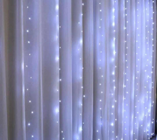 White curtain and cold white LED fairy light backdrop. Includes a $25 bond refunded after your hire.